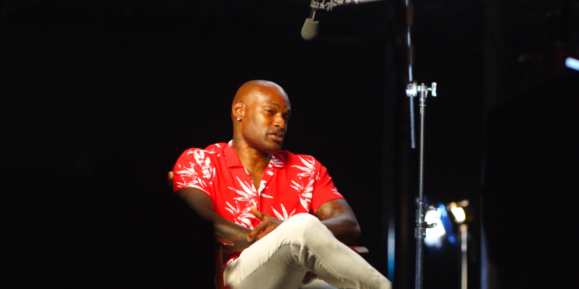 A man seated for an interview