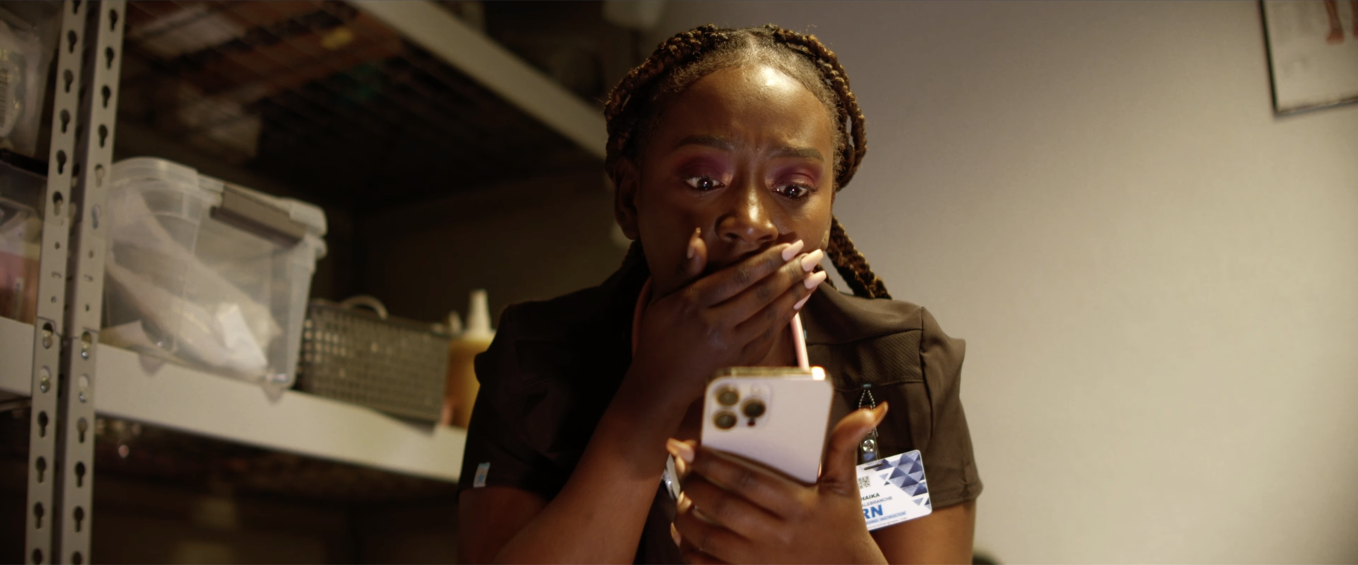 A nurse looking at her phone