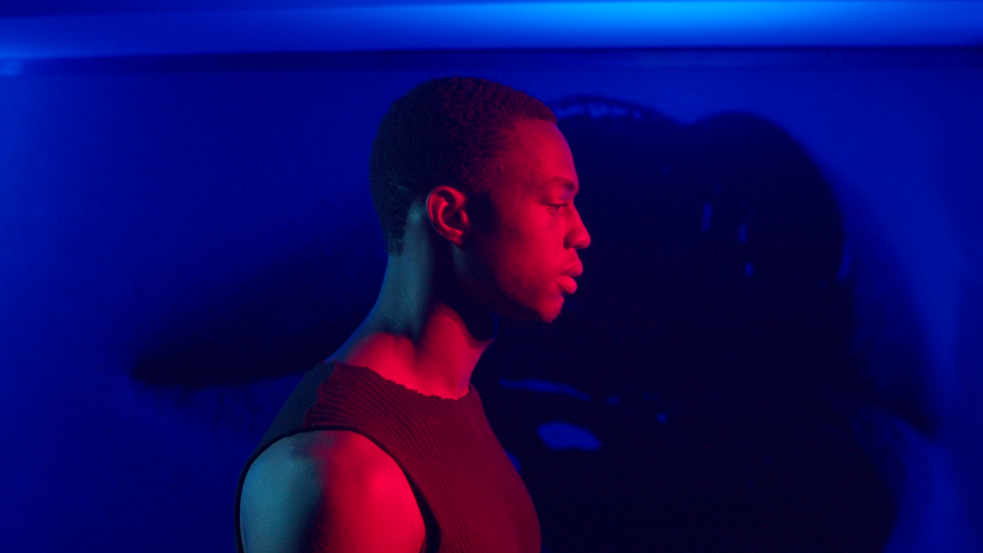 Portrait lit in red and blue
